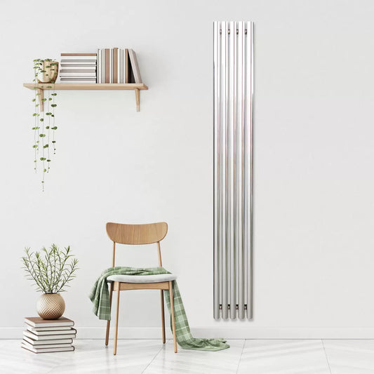 Front view of the Ultraheat Imperium chrome radiator with five straight rounded horizontal tubes mounted against a contemporary neutral bathroom wall.