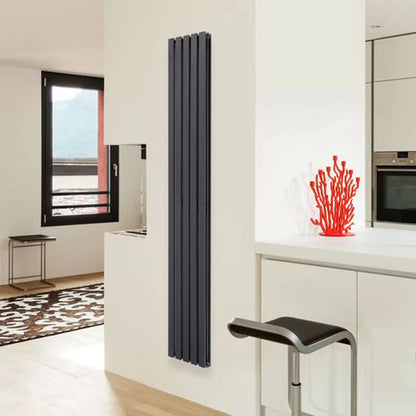 Vertical Ultraheat Linear Radiator in a contemporary living space showing 10 slim powder-coated steel columns mounted flush against a modern wall.
