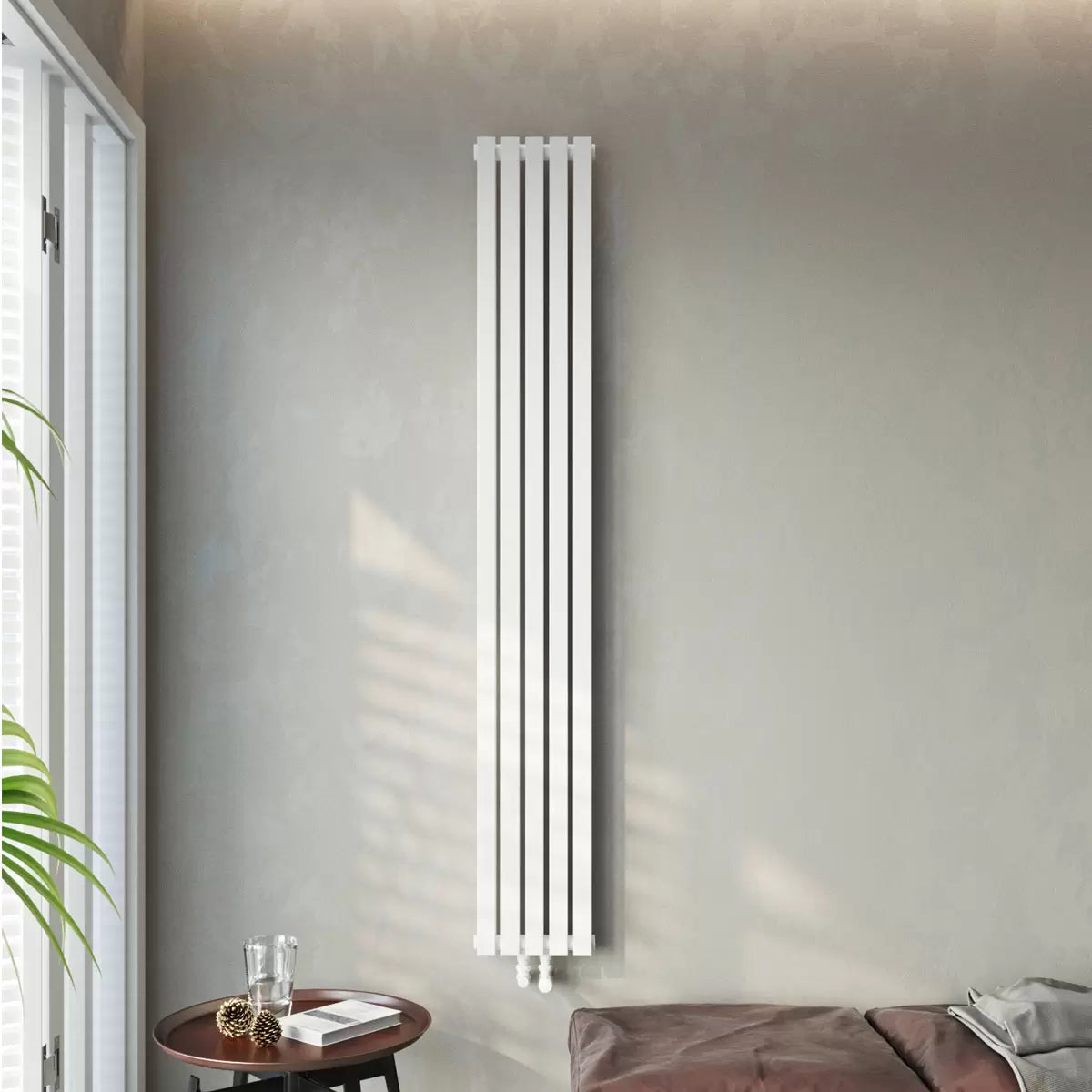 Vertical Ultraheat Linear Radiator in a contemporary living space showing 10 slim powder-coated steel columns mounted flush against a modern wall.