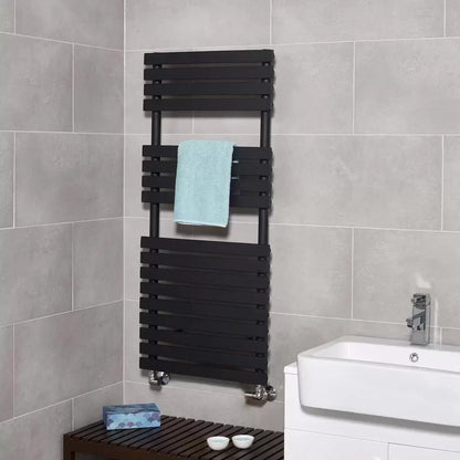 Front angle view of the Ultraheat Poplar Radiator featuring 17 flat horizontal bars in a dark micro grain textured finish mounted against a light tiled bathroom wall.