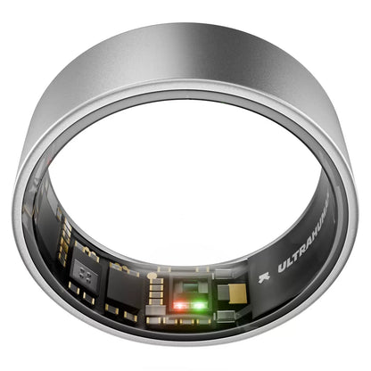 Close-up shot of the Ultrahuman Ring AIR Raw Titanium in dark grey displaying its smooth metallic finish on a dark background.