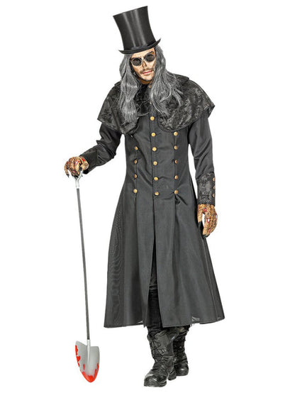 Front view of an adult male wearing a long black undertaker trench coat with wide-brim hat against a dark backdrop.