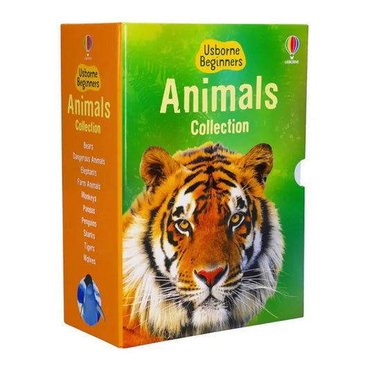 Open hardcover Usborne Beginners Animals book showing colorful penguin photographs and simple text displayed alongside the complete 10-book boxset.