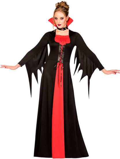 Front view of a woman wearing a floor-length crimson velvet and black lace Vampire Lady costume with a high standing collar against a dark backdrop.