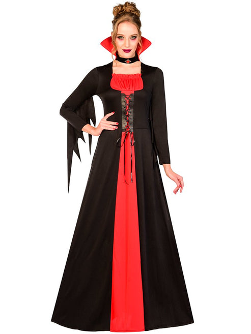 Front view of a woman wearing a floor-length crimson velvet and black lace Vampire Lady costume with a high standing collar against a dark backdrop.