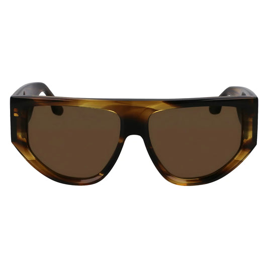 Side-profile view of the vibrant Victoria Beckham VB 676S 318 sunglasses resting on a dark, reflective surface in bright, natural light.