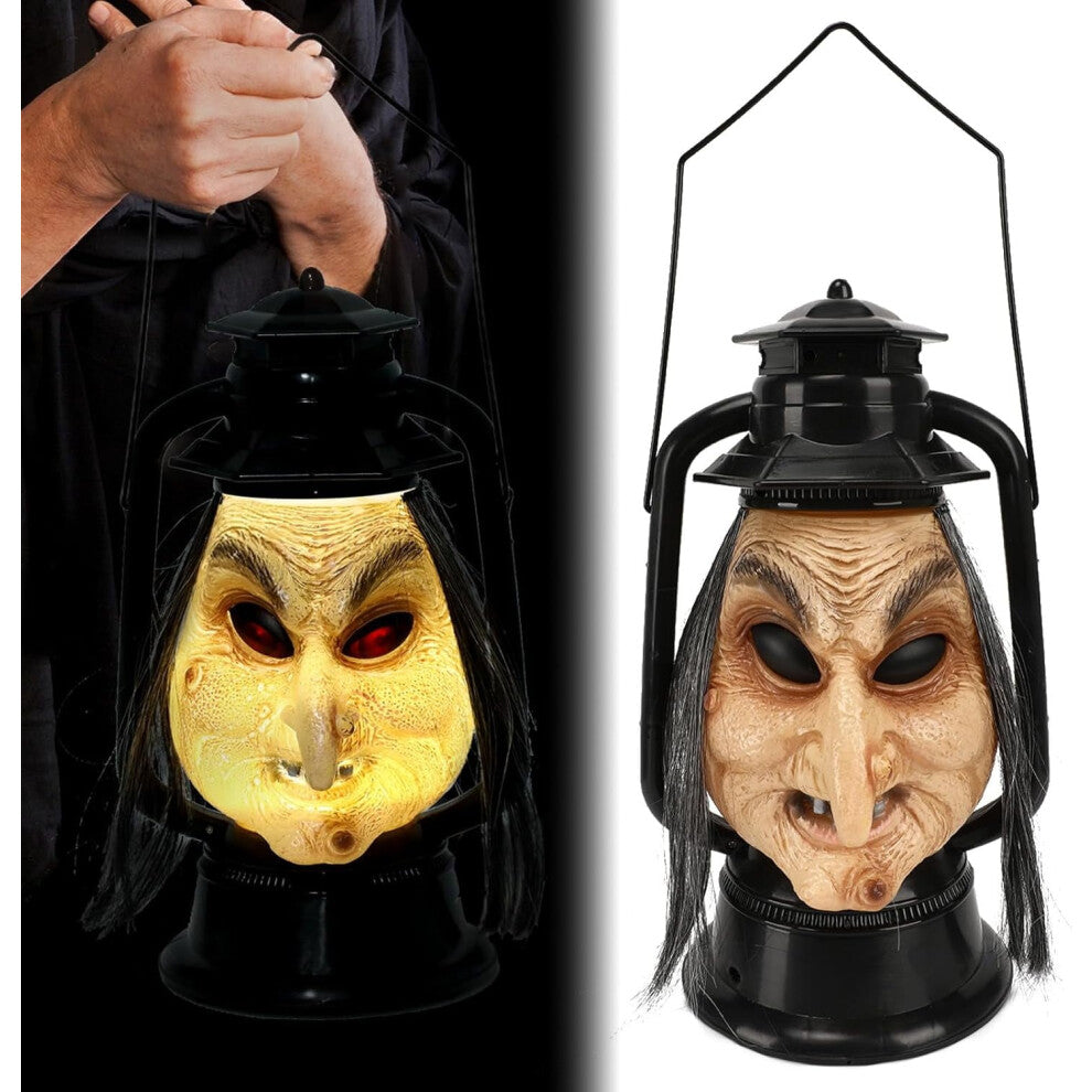 A handcrafted vintage Halloween long hair witch hanging decoration with LED lights and sound effects displayed in a spooky garden setting.