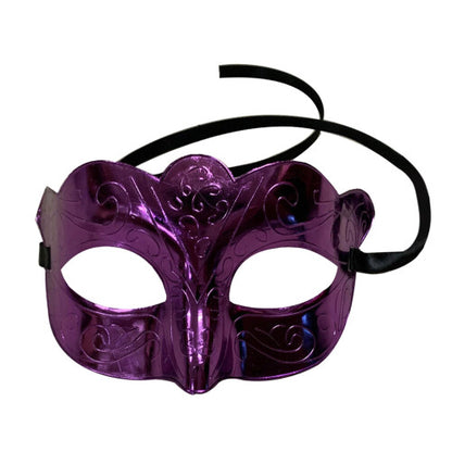 Vintage plastic masquerade eye mask with sculpted scrollwork contours displayed against a clean background.
