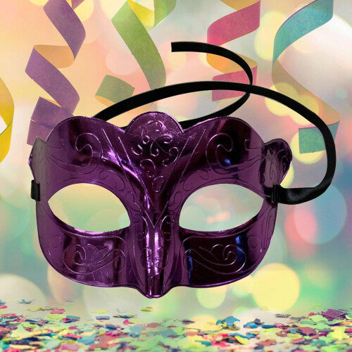 Vintage plastic masquerade eye mask with sculpted scrollwork contours displayed against a clean background.