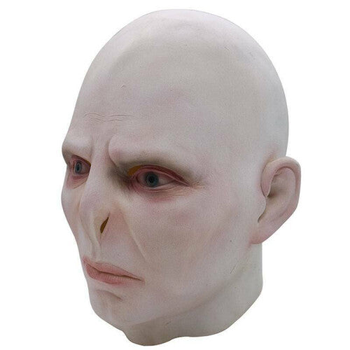 Front view of a full head Voldemort latex horror mask featuring detailed pale skin texturing, sunken eyes, and snake-like facial features on a plain backdrop.