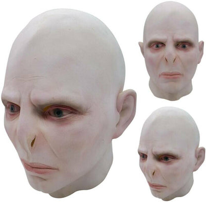 Front view of a full head Voldemort latex horror mask featuring detailed pale skin texturing, sunken eyes, and snake-like facial features on a plain backdrop.