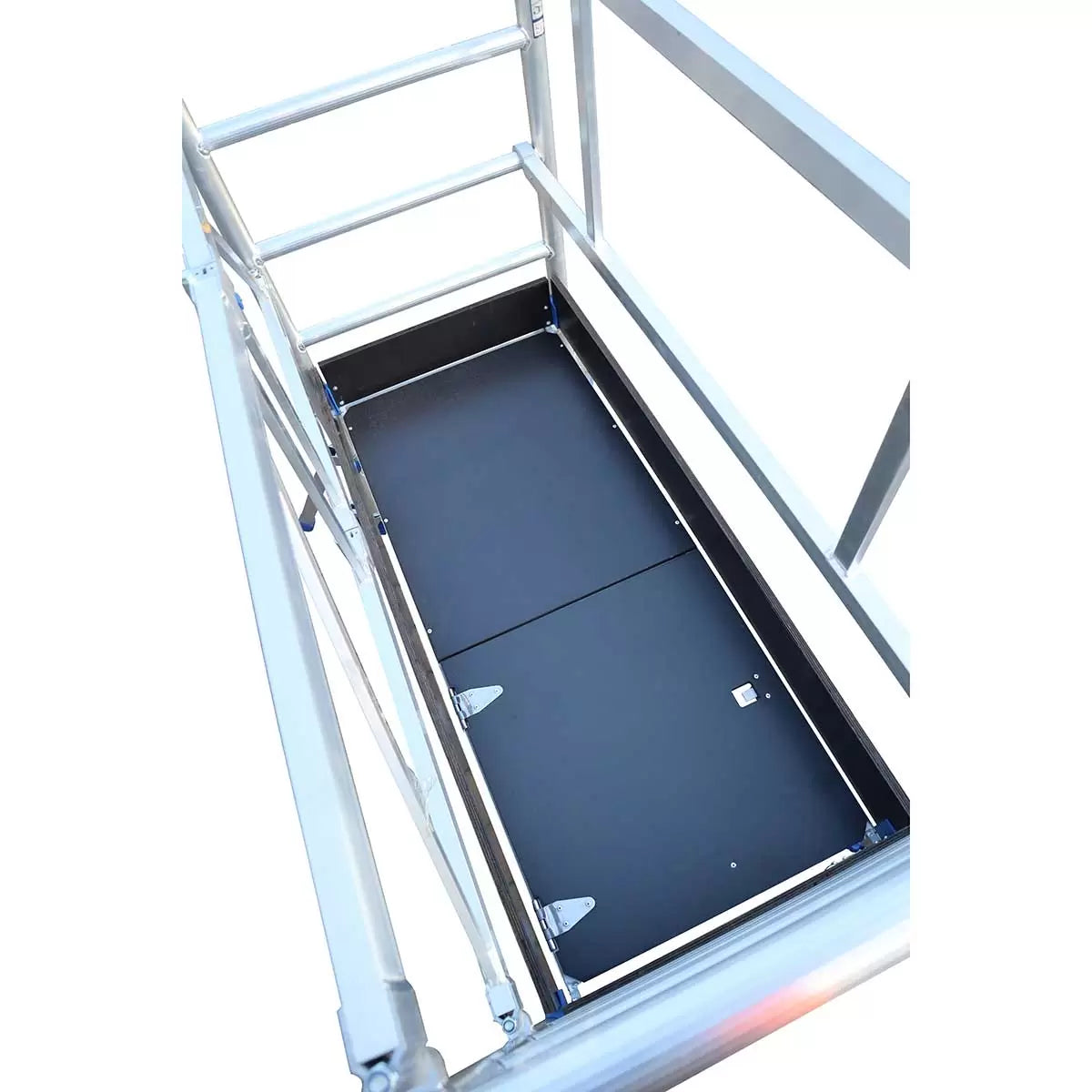 A silver aluminium Werner PROPLUS folding scaffold tower base pack with black swivel castors, a platform deck featuring an integrated trapdoor, and protective wooden toe boards set against a plain backdrop.