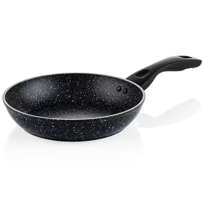 An elegant 11-piece Westinghouse black marble cookware set arranged on a modern kitchen countertop.