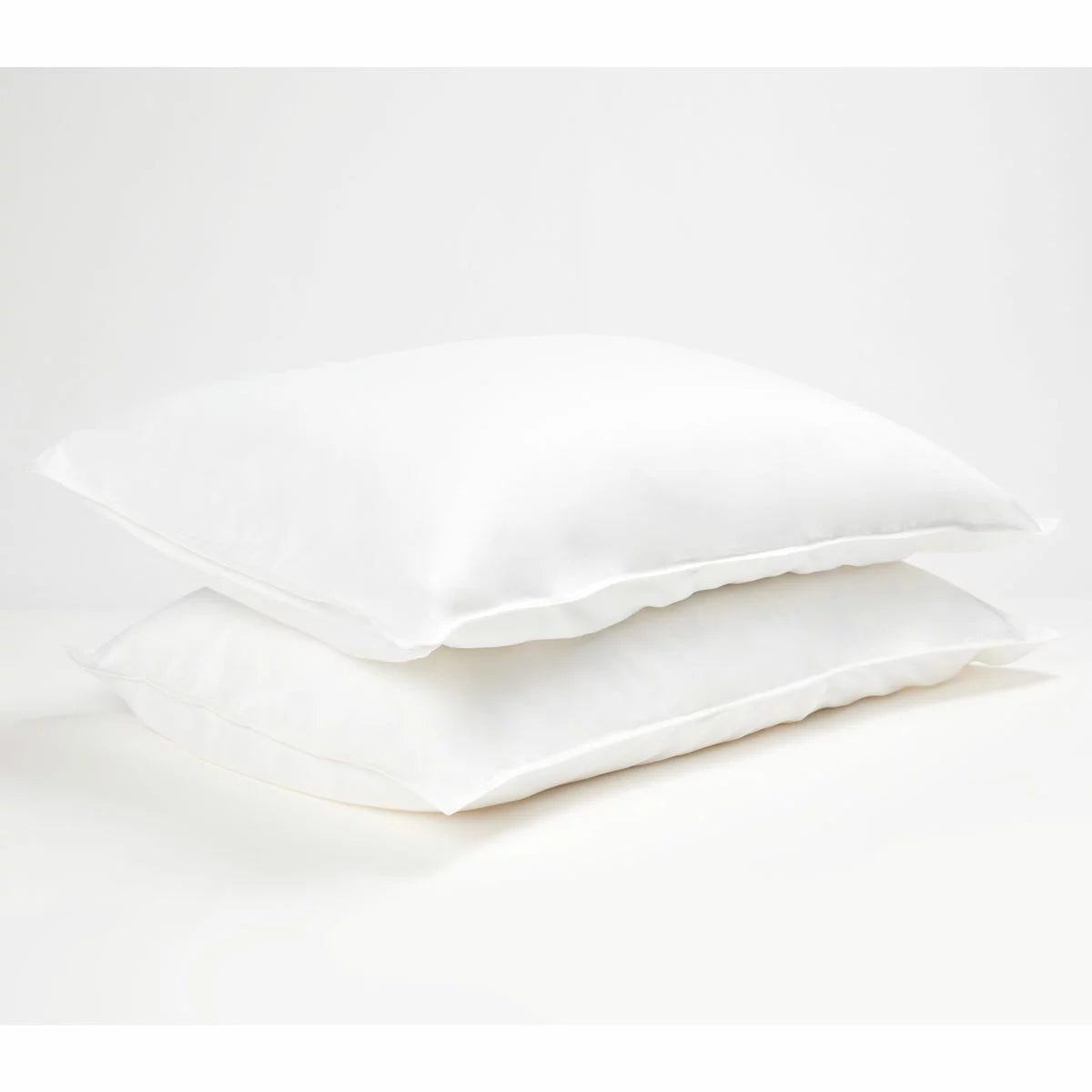 Panda White Bamboo and French Linen Duvet Cover Set on a bed featuring crisp matte texture, Oxford pillowcase edges, and raw bamboo buttons.