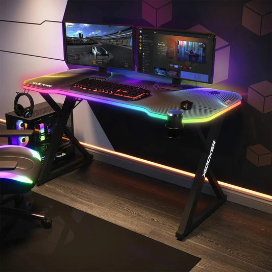 X Rocker Pulsar Max RGB gaming desk with LED lights and carbon fiber desktop setup