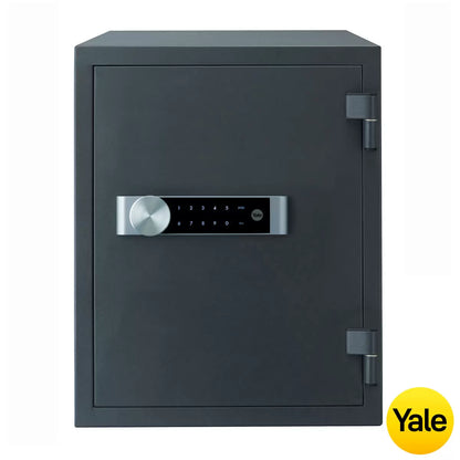 Front view of a charcoal grey Yale extra large fire safe featuring an illuminated digital touch keypad and solid steel handle, resting securely on a modern wooden office floor.