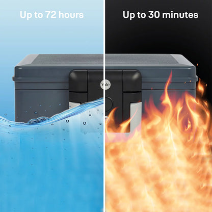 Front view of the black Yale 6.9L medium fire and waterproof chest safe with key lock and integrated handle sitting flat on a wooden surface.