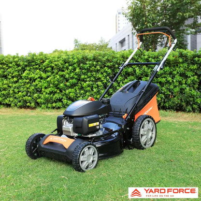 YardForce 167cc Honda engine self-propelled petrol lawn mower with 51cm cutting width mowing a large residential lawn
