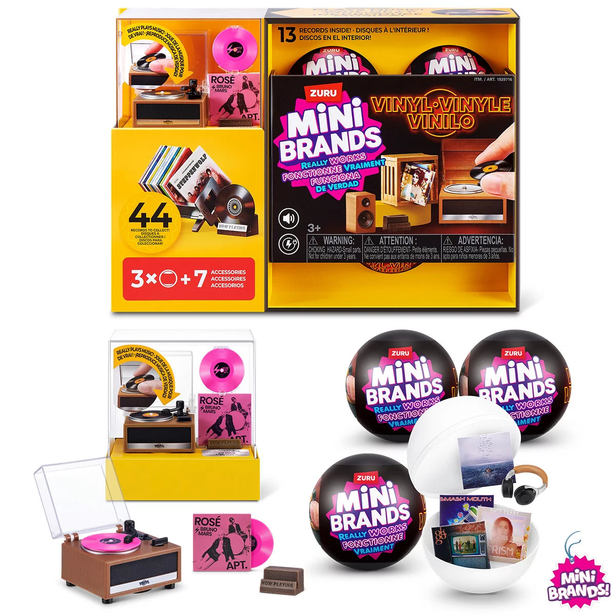 Three colorful ZURU Mini Brands mystery capsules set next to a tiny working black and red mini record player with mini vinyl records spread across a white surface.