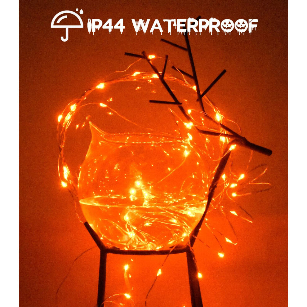 A 3-meter strand of 30 orange LED fairy lights on micro silver wire glowing softly around an indoor window frame.