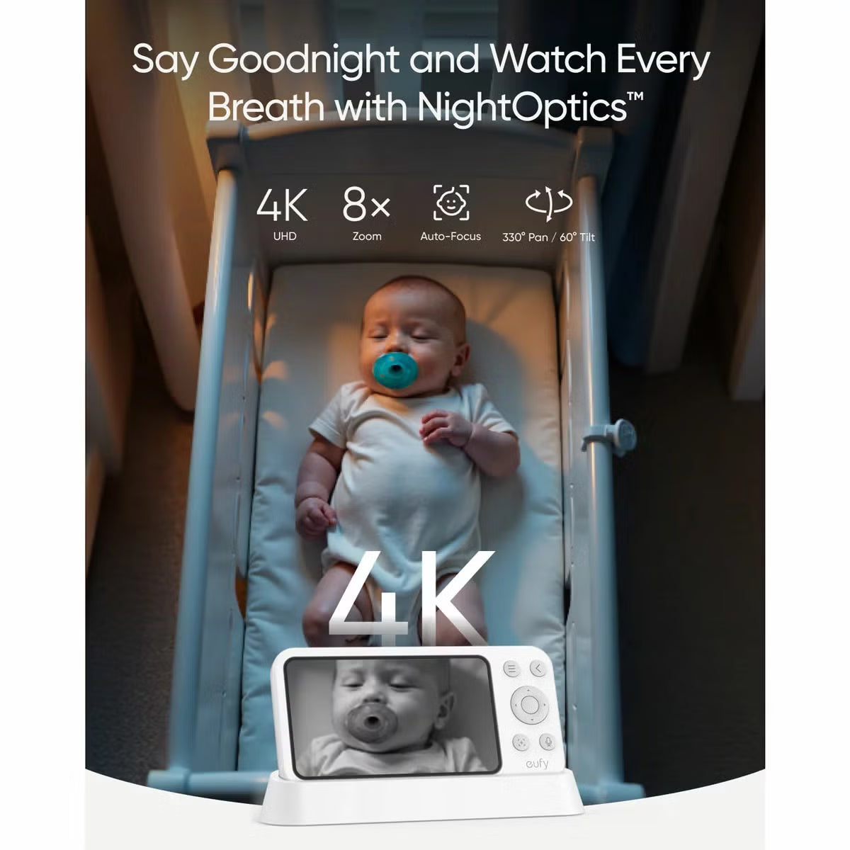 White eufy E21 smart baby monitor camera with pan tilt lens resting beside the 5 inch handheld color screen parent display unit.