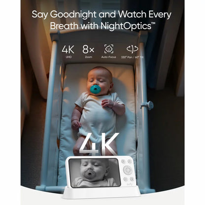 White eufy E21 smart baby monitor camera with pan tilt lens resting beside the 5 inch handheld color screen parent display unit.