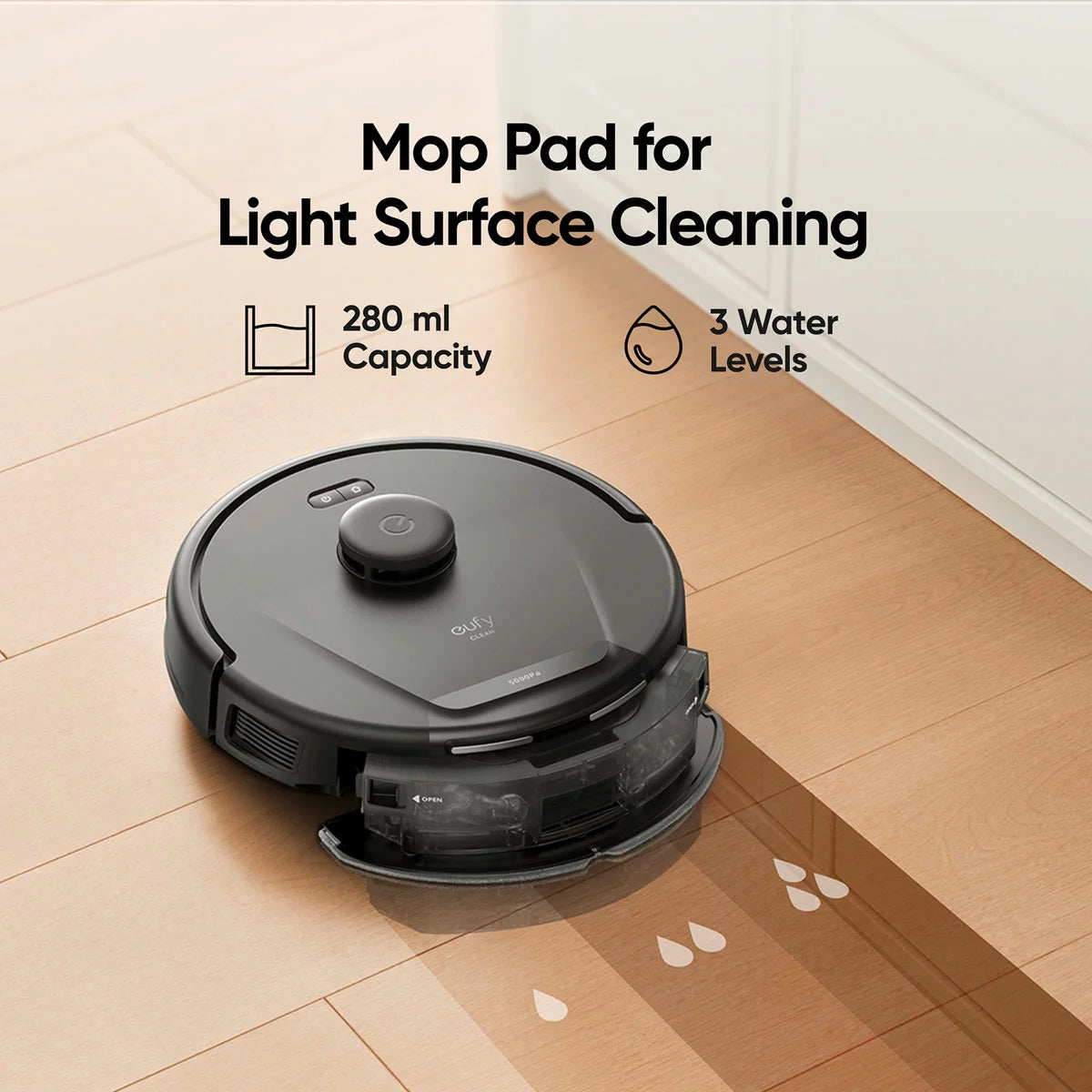 eufy L60 Hybrid black robotic vacuum and mop unit showing laser navigation sensor top dome on dark hardwood flooring