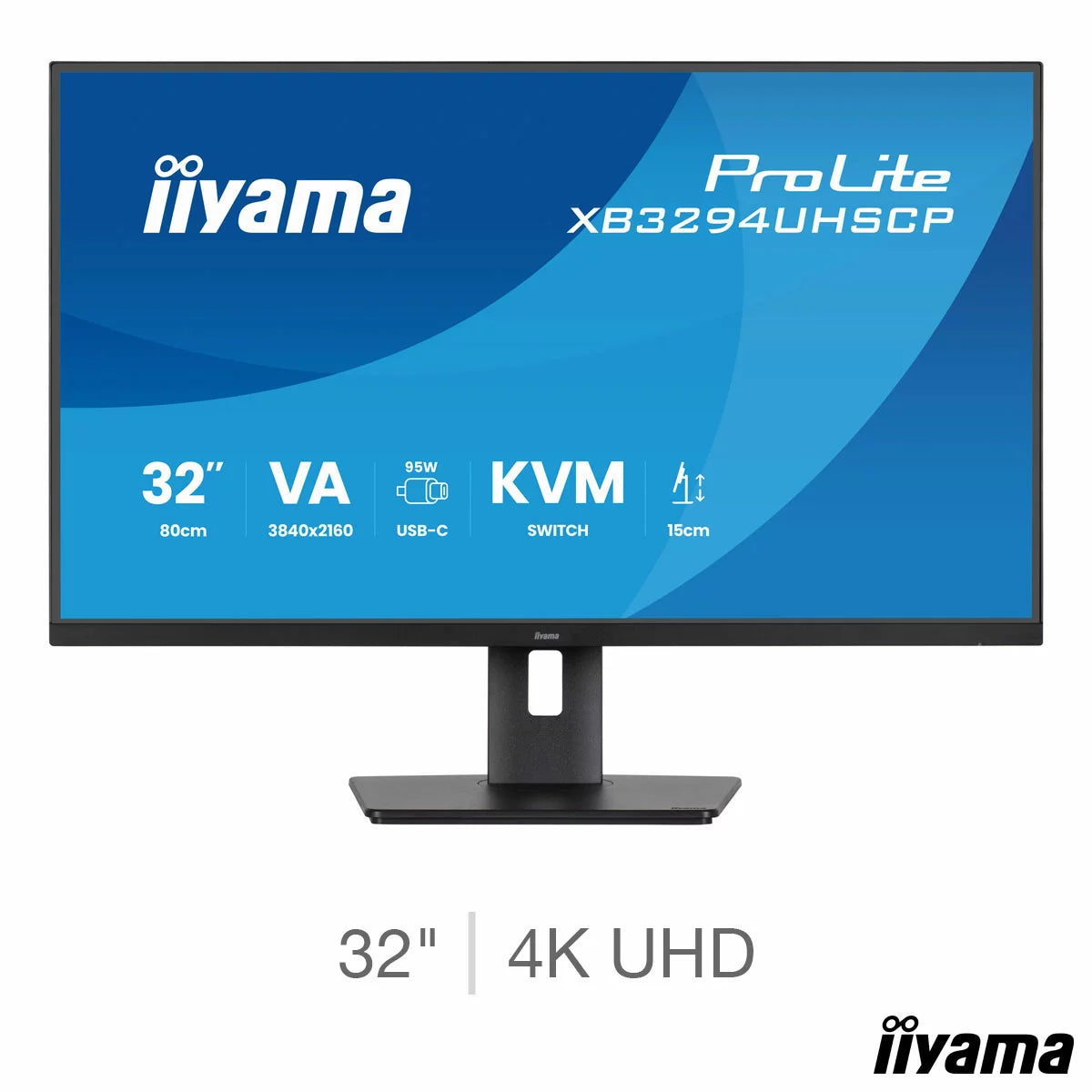 A sleek matte black 32-inch iiyama ProLite 4K professional monitor with thin bezels sits on a minimalist wooden office desk, showcasing a crisp multi-window data layout in a bright studio.