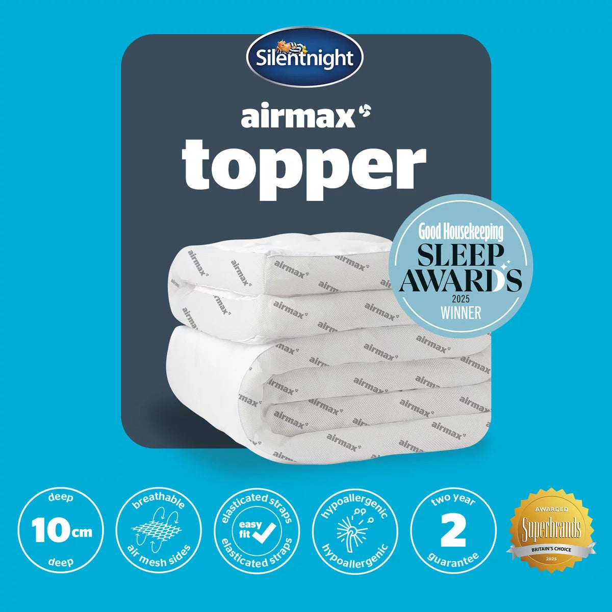 Silentnight Airmax 1000 Mattress Topper fitted on a modern bed with visible breathable mesh trim and elastic corner straps in a bright bedroom setting.