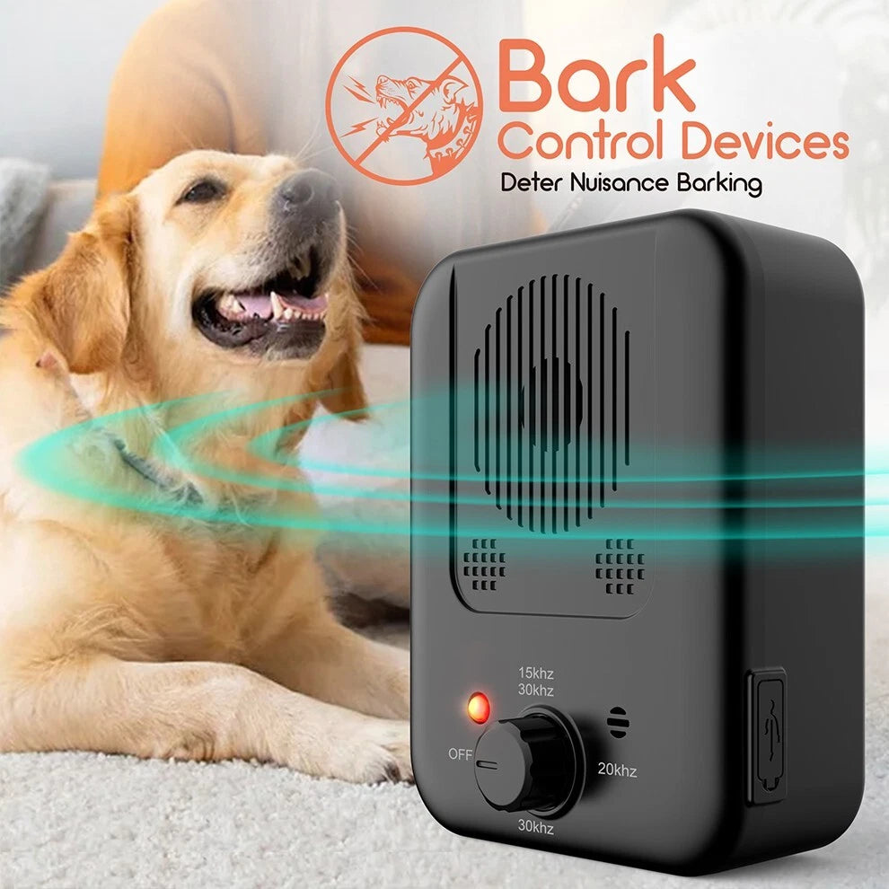 Handheld ultrasonic anti barking device pointed at a barking dog outdoors showing 3-level control button-5