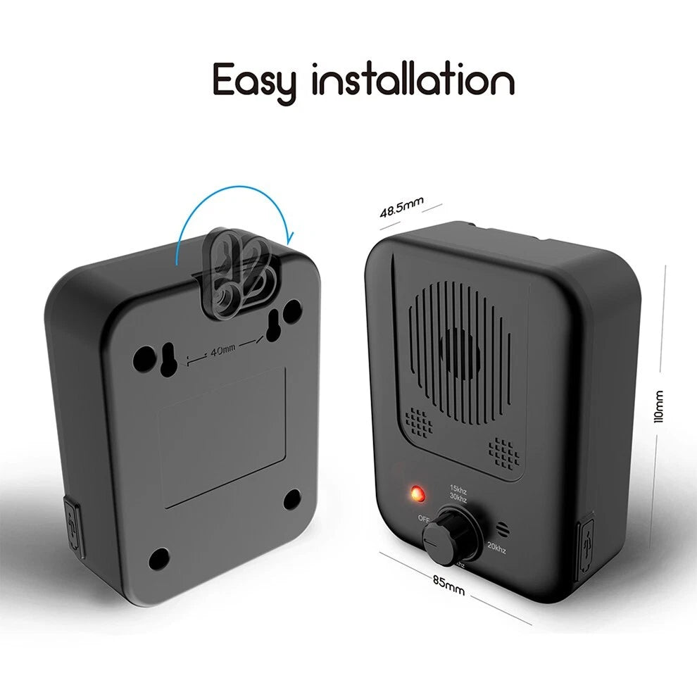 Handheld ultrasonic anti barking device pointed at a barking dog outdoors showing 3-level control button-8