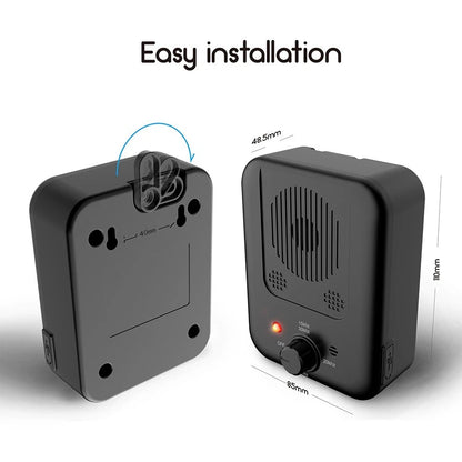 Handheld ultrasonic anti barking device pointed at a barking dog outdoors showing 3-level control button-8