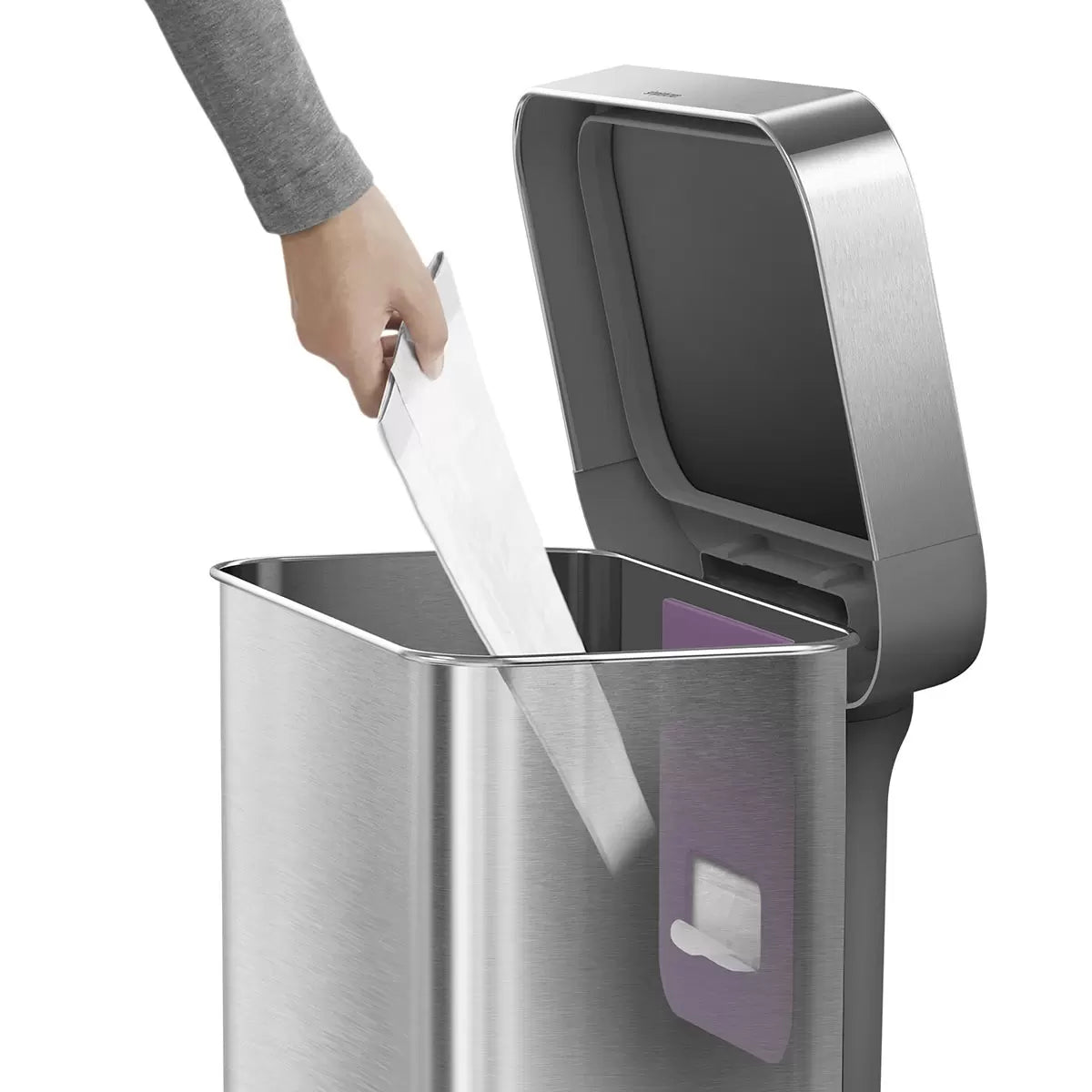 Front angle view of the simplehuman 55L brushed stainless steel step bin with grey plastic lid set against a bright modern kitchen backdrop.