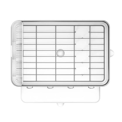 simplehuman stainless steel dish rack with swivel spout drainer on a clean kitchen countertop